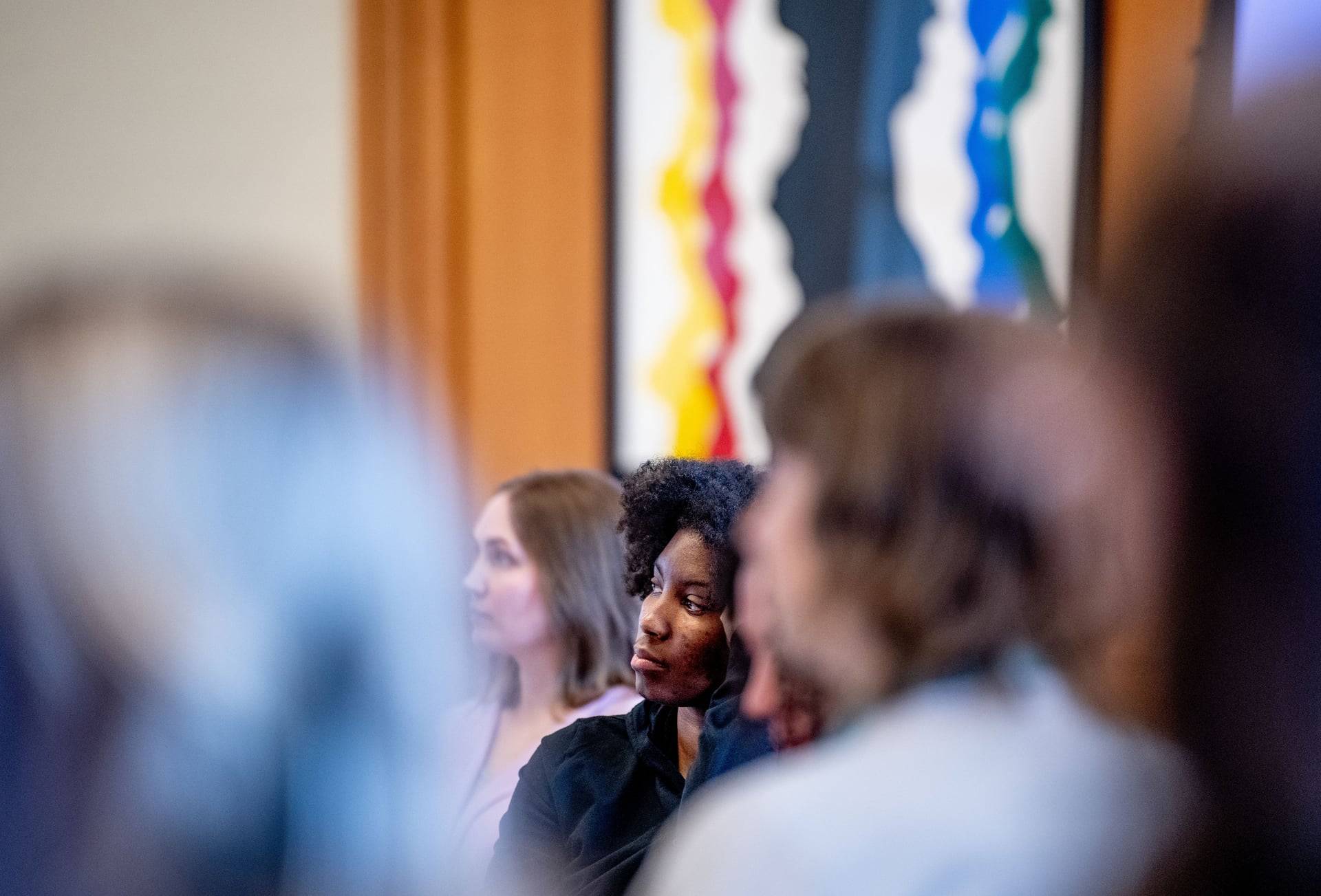 Audience listening to a speaker
